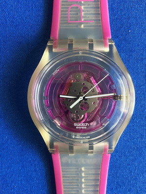 Swatch wristwatch with battery, pink silicone strap