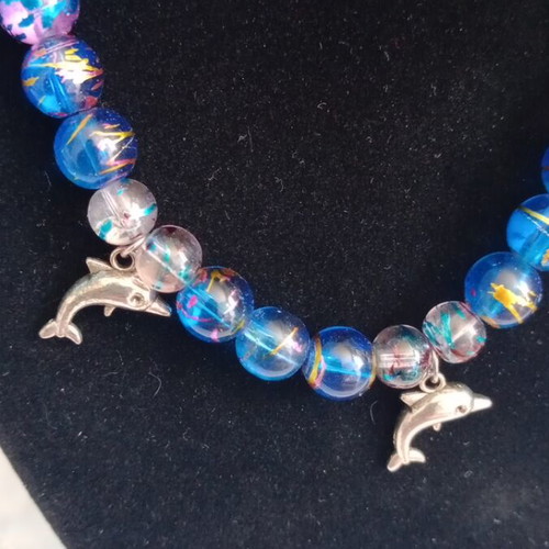 Necklace summer beads with three small dolphins handmade like new