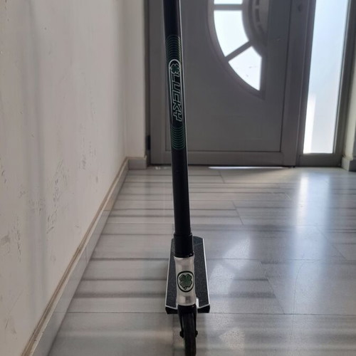 Lucky Crew Pro Stunt Scooter used with chrome deck and green details