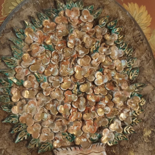 Handmade wall decoration with decoupage and clay flowers