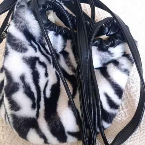 Fur pouch bag like new with zebra pattern crossbody