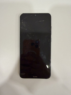 Xiaomi Redmi 8 smartphone used with cracked screen and damages
