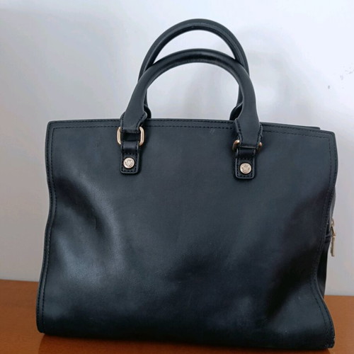Love Moschino black hand bag like new with charms