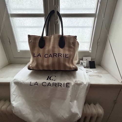 La Carrie large tote bag used, beige striped canvas with leather handles