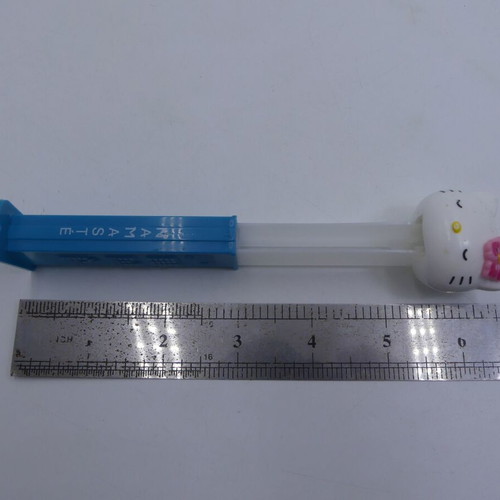 Hello Kitty Pez Dispenser used, Yoga Pez Namaste pink flower