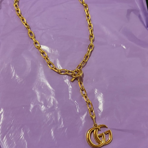 Gucci gold necklace with large GG pendant and chain, new