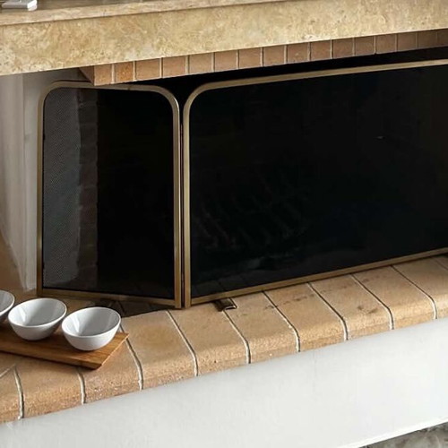Fireplace screen trifolding with tool set used