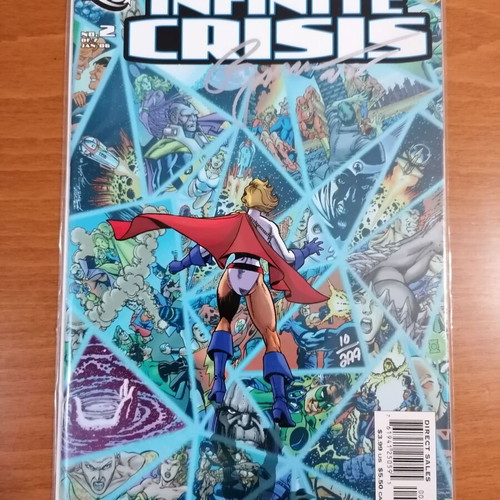 Infinite Crisis #2 signed DC Comics comic like new