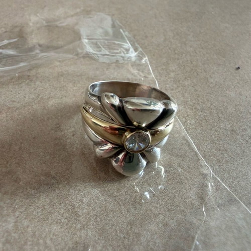 Silver and gold ring with diamond used
