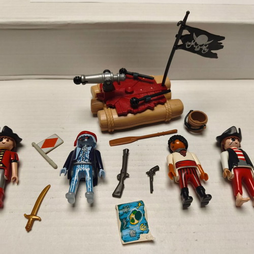 Playmobil pirates set used with 4 figures and functional cannon