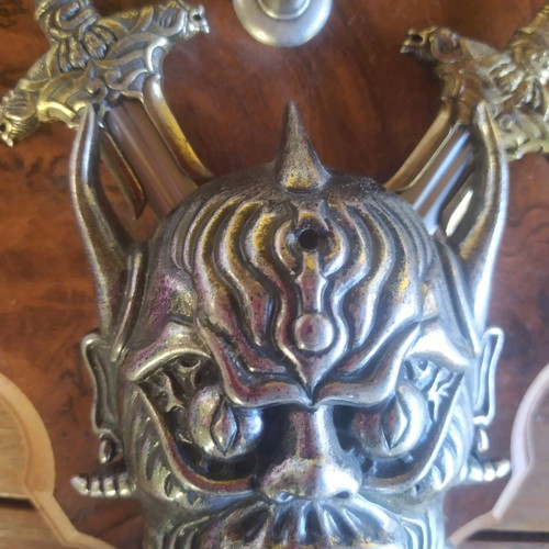 Decorative wall hanging used with swords