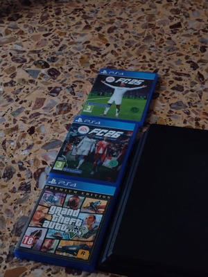 PS4 Pro console with 3 games and 2 controllers