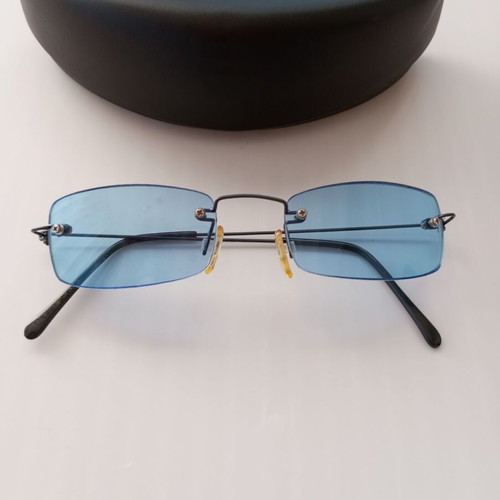 Vintage Y2K Sunglasses with Blue Lenses and Collectible PezeRva Case like new