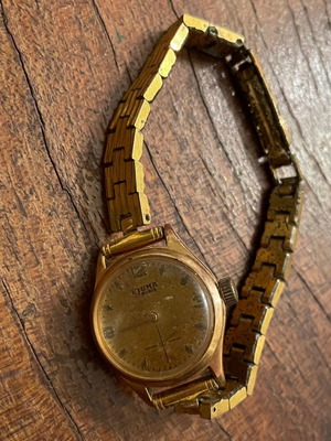Vintage branded watch functional with signs of use