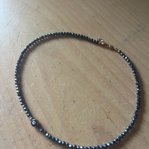 Necklace new dark blue with an eye bead