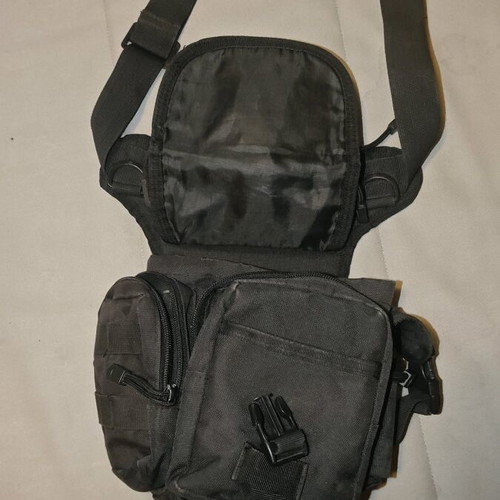 Thigh bag used with multiple compartments and phone pocket