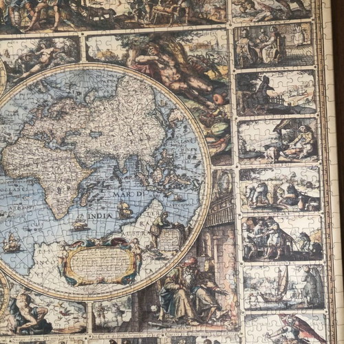 World puzzle with frame used, brown color and glass