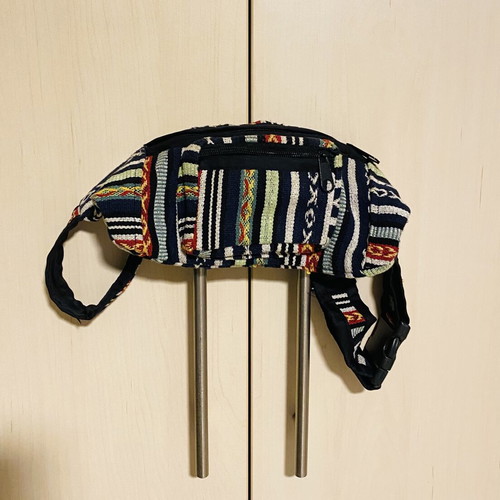 Waist bag like new, woven style, black and multicolor