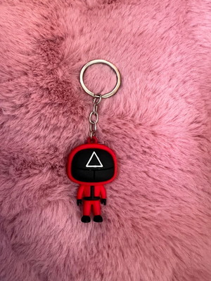 Squid Game keychain in like new condition, black and red
