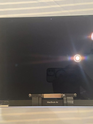 MacBook Air A2337 screen used with minor corner damage