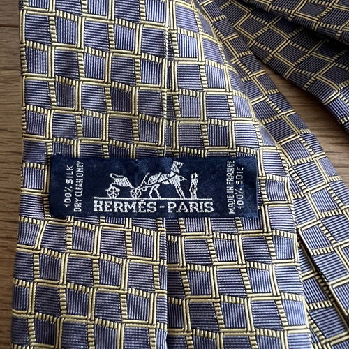 Hermes silk tie like new with geometric basketweave pattern in blue and yellow