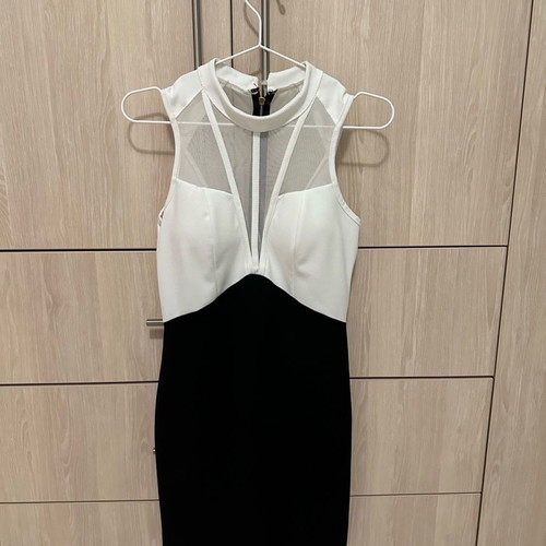 Dress one size used, elastic in excellent condition