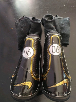 Adidas shin guards used, size L