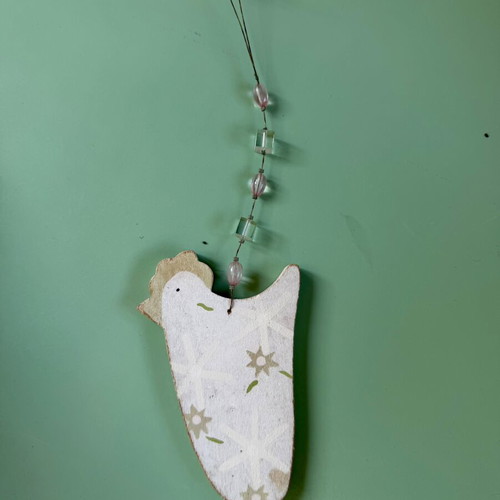 Wooden hanging decoration in chicken shape