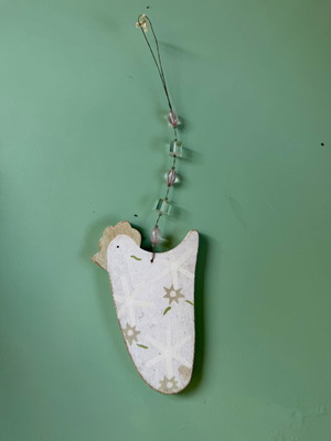 Wooden hanging decoration in chicken shape