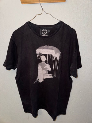 Black Cotton4all short-sleeve T-shirt size L like new with graphic design