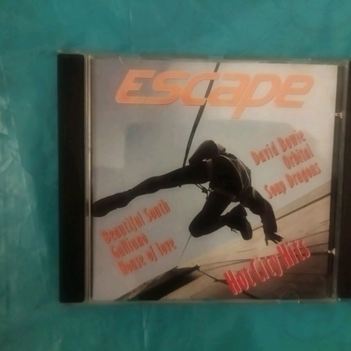 Escape Hot City Hits and Snow Motion Music CDs like new