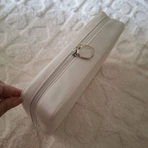 White Kerastase toiletry bag like new with 3 inner pouches