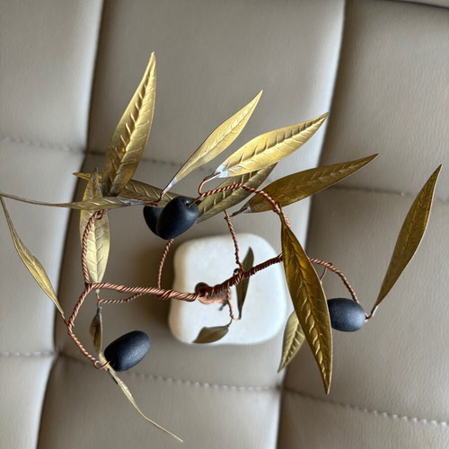 Handmade olive decoration on marble base used