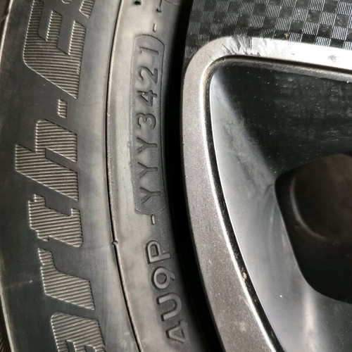 Yokohama tires 175/65/14 with steel rims and hubcaps like new