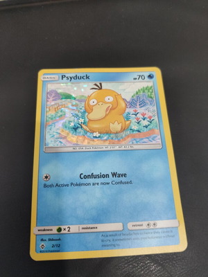 Psyduck Pokemon card, holo