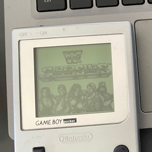Game Boy WWF Superstars cartridge used with German manual