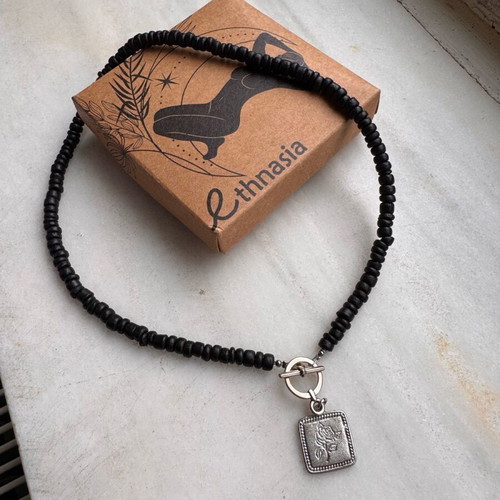 Ethnasia necklace used with black beads and rose charm