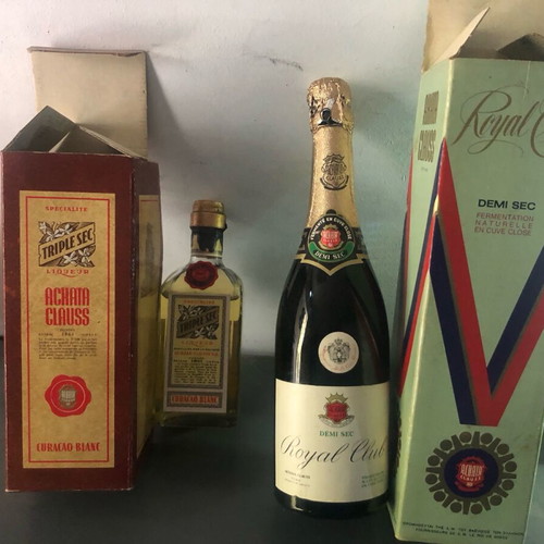Achaia Clauss collectible champagne and Curacao bottles new, pack of 2