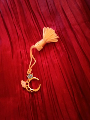 Handmade Christmas star charm with blue hat and golden tassel like new