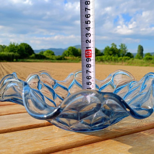 Glass carved fruit bowl used with blue color