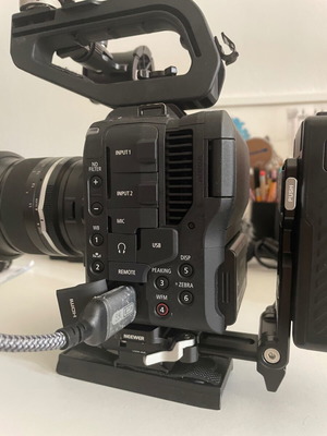 Canon C70 cinema camera like new with booster adapter and batteries