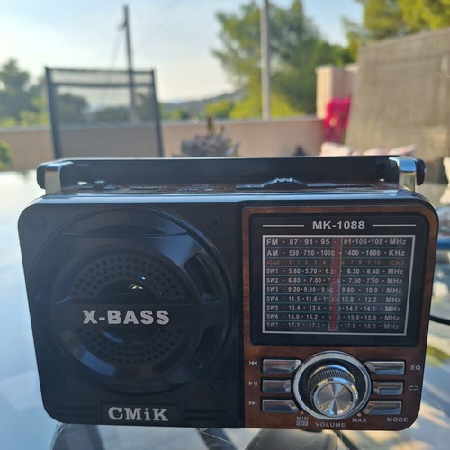 CMiK portable radio with flashlight and AUX cable