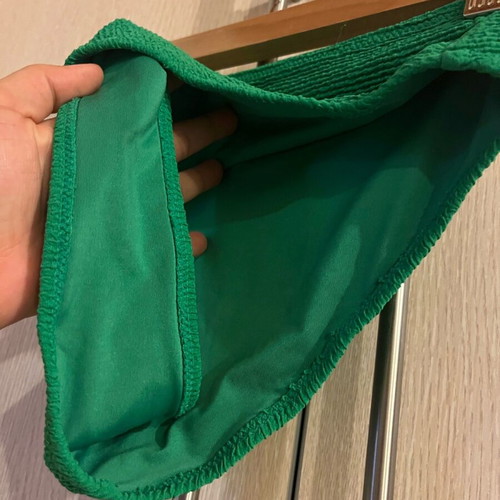 Green bikini with one shoulder and high waist used, size S