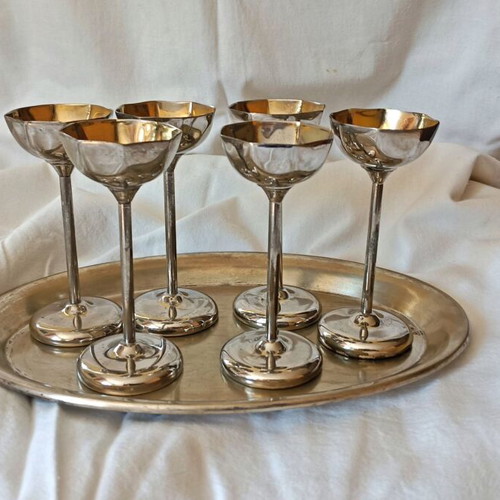 Vintage liqueur glasses used, brass with silver plating and gold interior