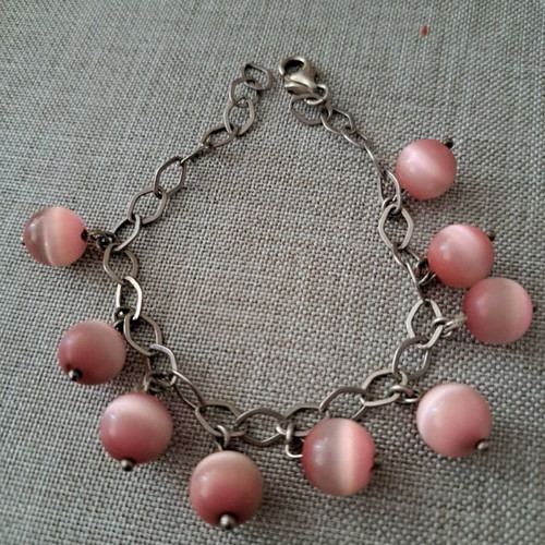 Silver women's bracelet like new with pink stones