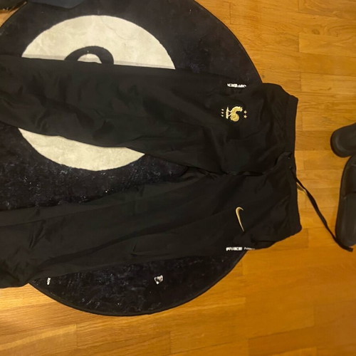 NikeXfrance pants L like new, black and gold