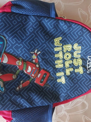 School backpack Polo like new with robot design and name tag