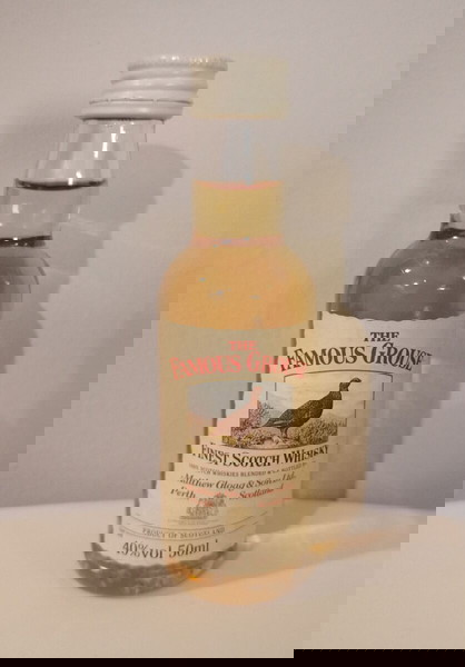Γυάλινο, μίνι, γεμάτο και σφραγισμένο μπουκάλι Ουίσκι "THE FAMOUS GROUSE BRAND"-FINEST SCOTCH WHISKY