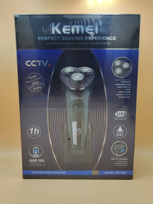 Kemei KM-2805 shaver like new with three heads