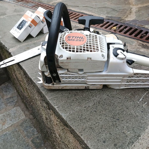 Stihl MS 251 chainsaw like new with three chains